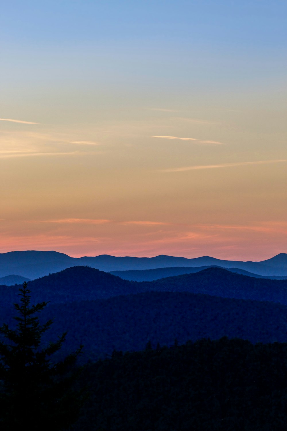 mountain hills under blue sky