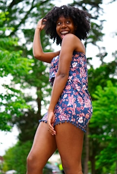 A cheerful person enjoying a healthy lifestyle outdoors.