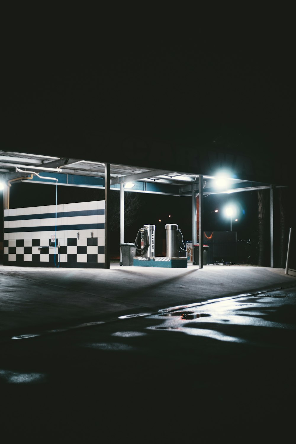 white and black wall on concrete floor