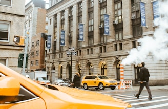 man crossing pedestrian lane