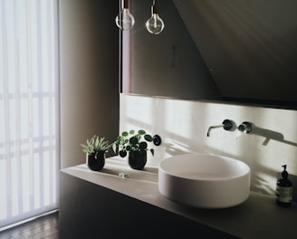 round white ceramic sink
