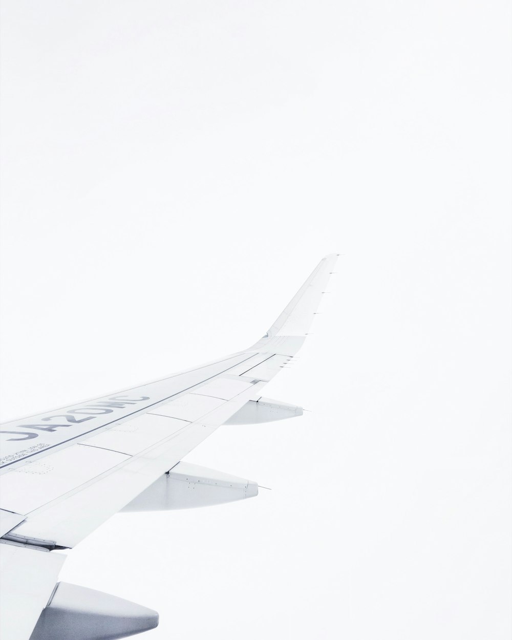 white airplane on air