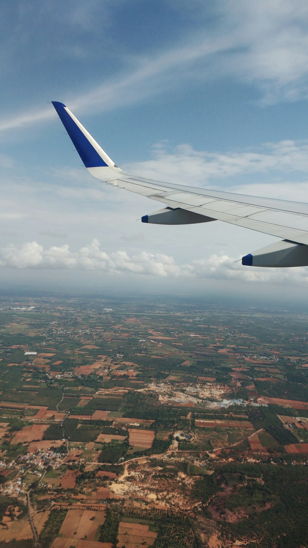 person showing left plane wing