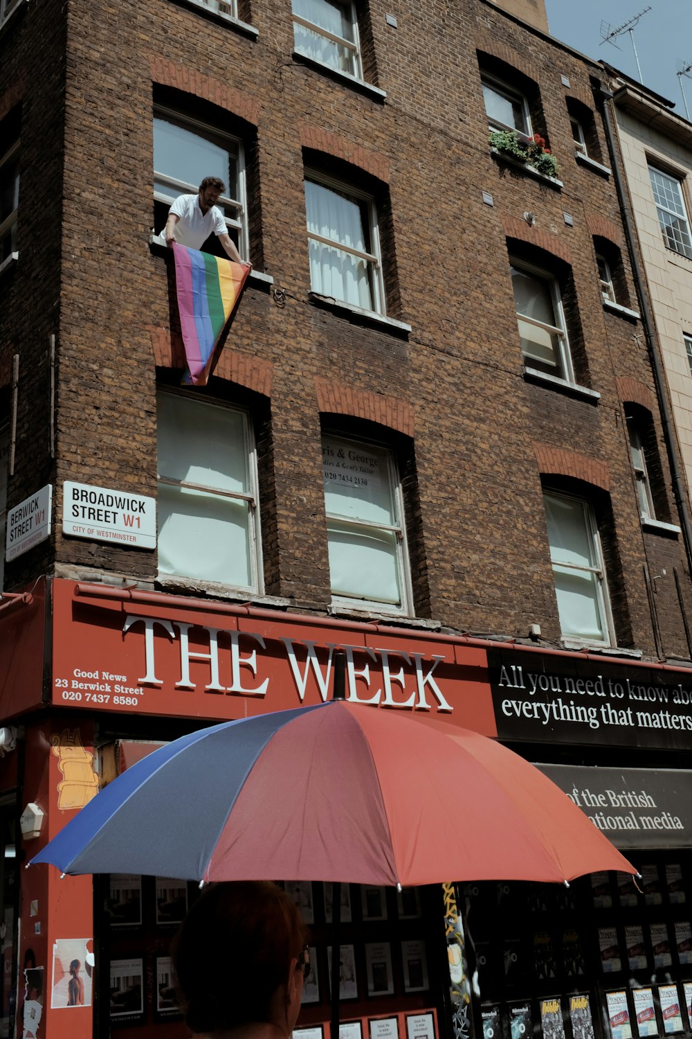 The Week sign on building at daytime