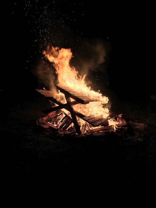 picnic bench on fire against black background in Rastenfeld Austria