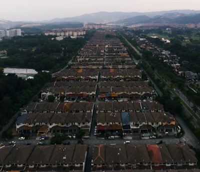 Aerial view of multiple homes in Chelmsford with newly completed roofing projects.