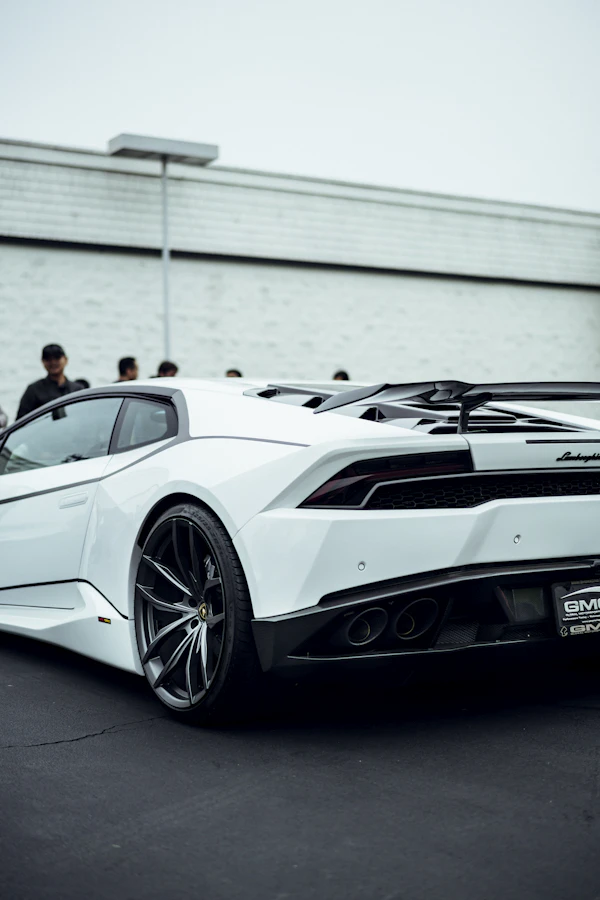 White Lamborghini Huracan supercar in a parking lot
