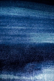 a dark blue area with a white stripe on it