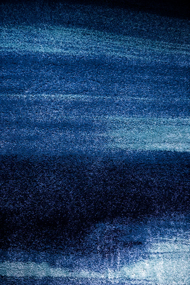 a dark blue area with a white stripe on it