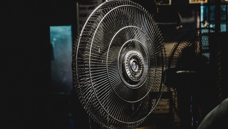 Finished installation of a sleek air circulator fan in a modern Saint Denis home