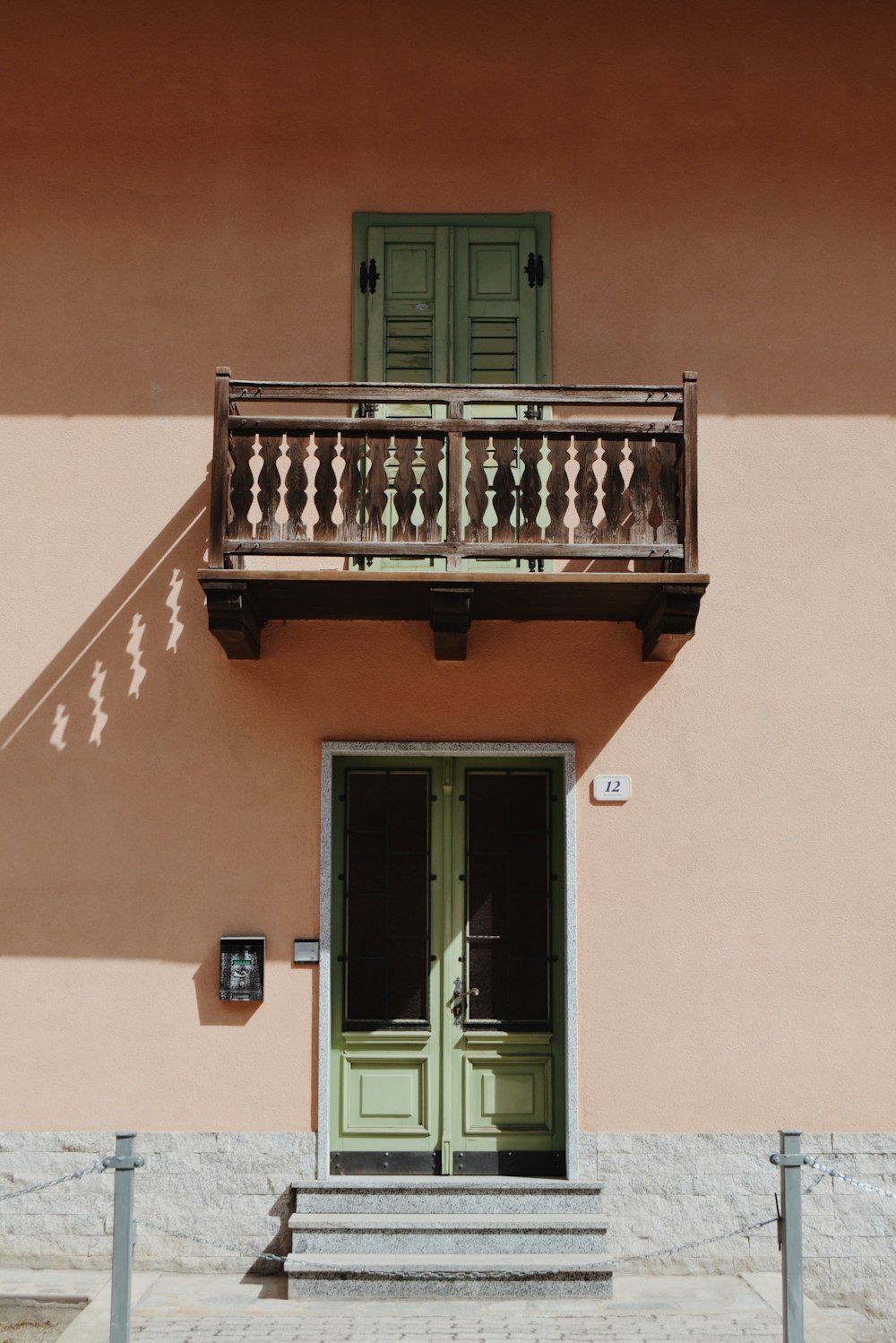 brown wooden terrace on pink wall