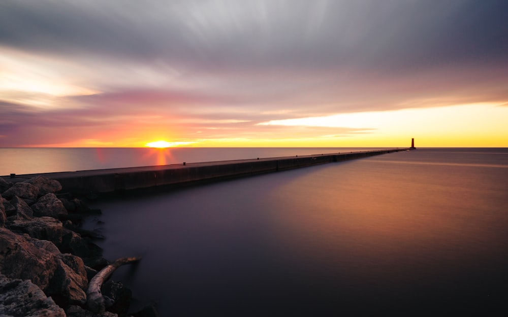 concrete dock in ocean