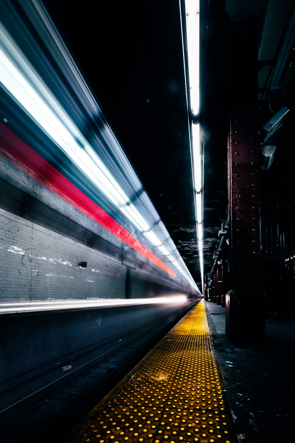 time lapse photography of train subway