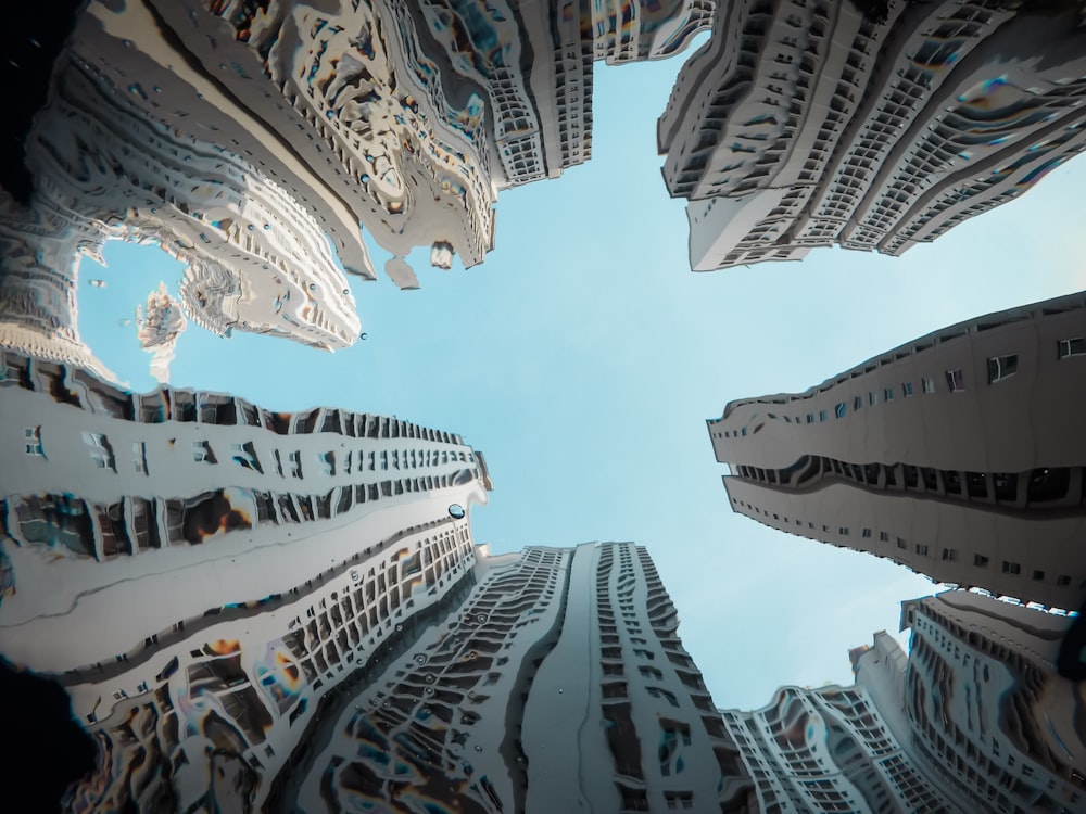 low-angle photography of high-rise buildings