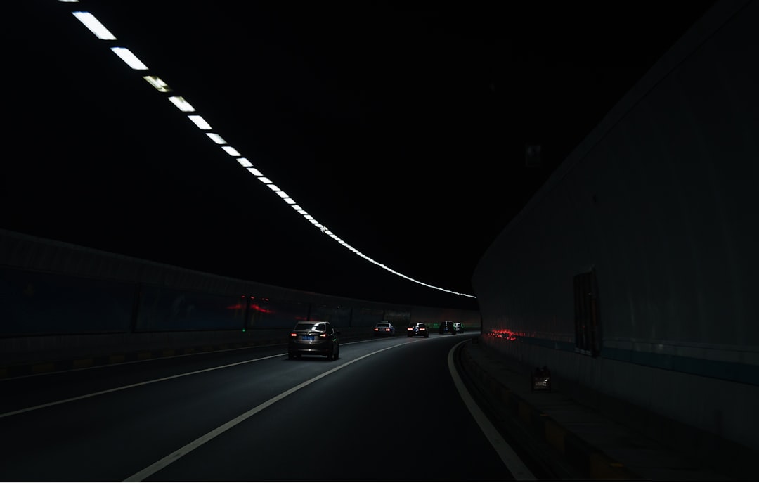 vehicles running in tunnel,