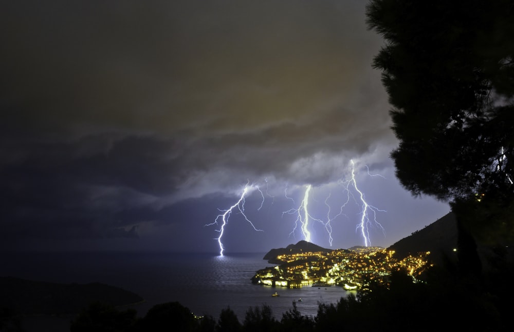 lightning overseeing through body of water