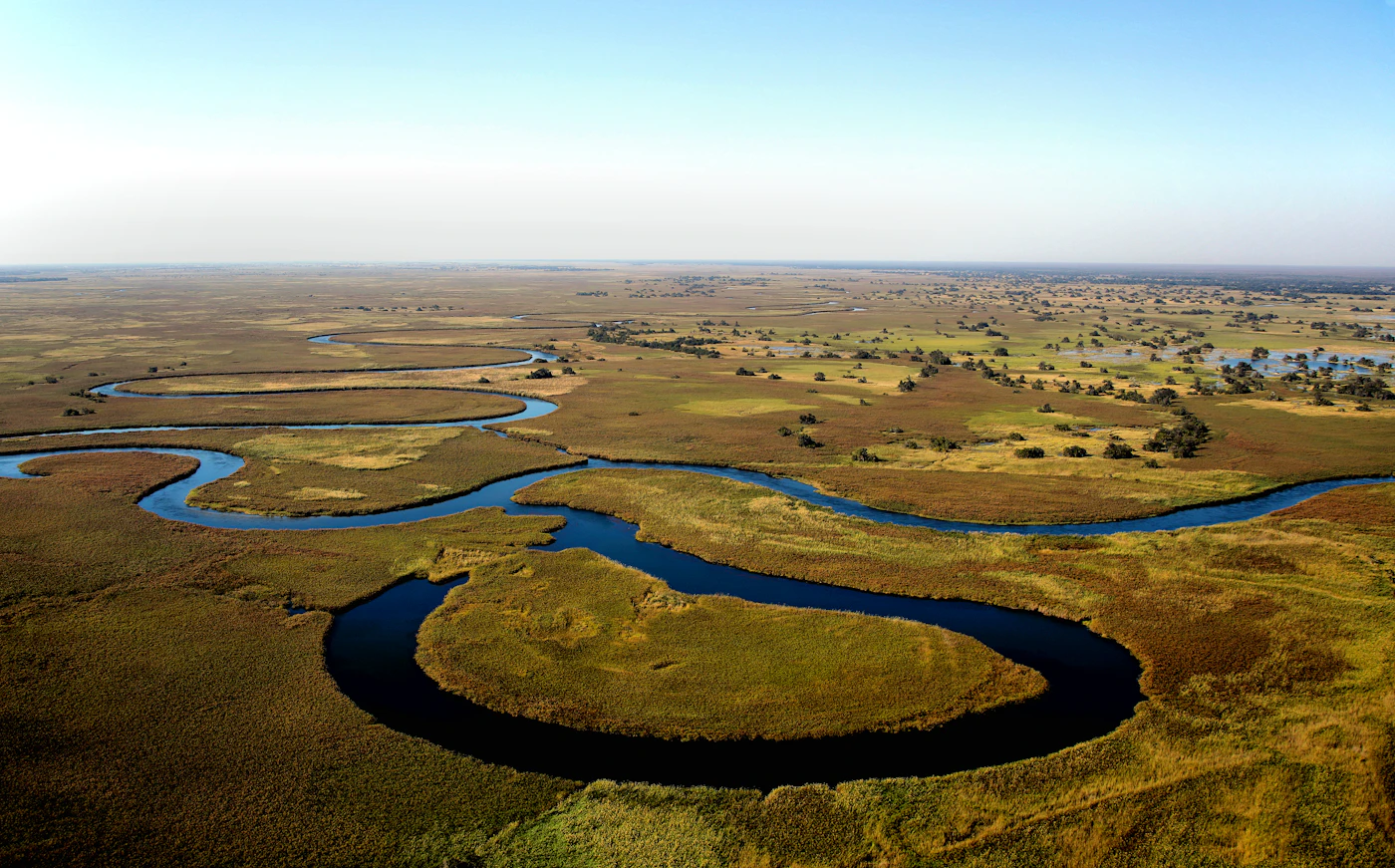 Aerial view of winding channels and islands in the Okavango Delta