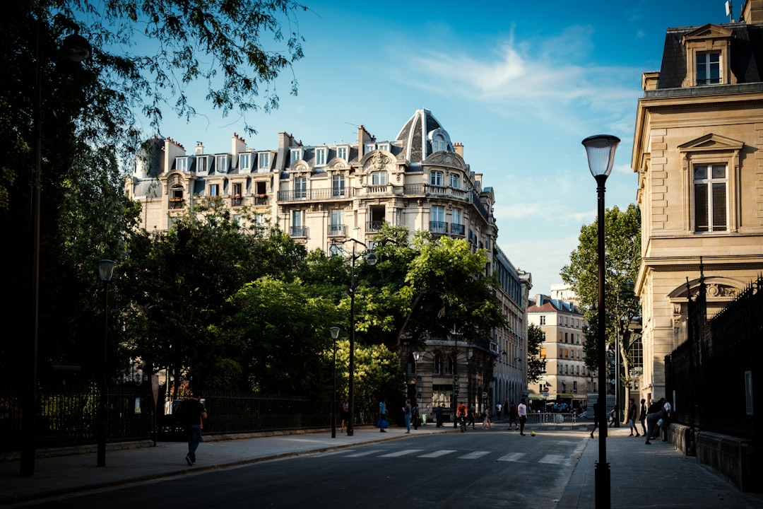 white painted building under blue sky, Park in the 3rd Arrondissement of Paris