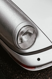 close up photography of vehicle headlight