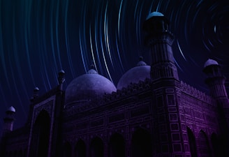 long-exposure photograph of star over mosque