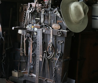 gray cowboy hat and mechanical tools