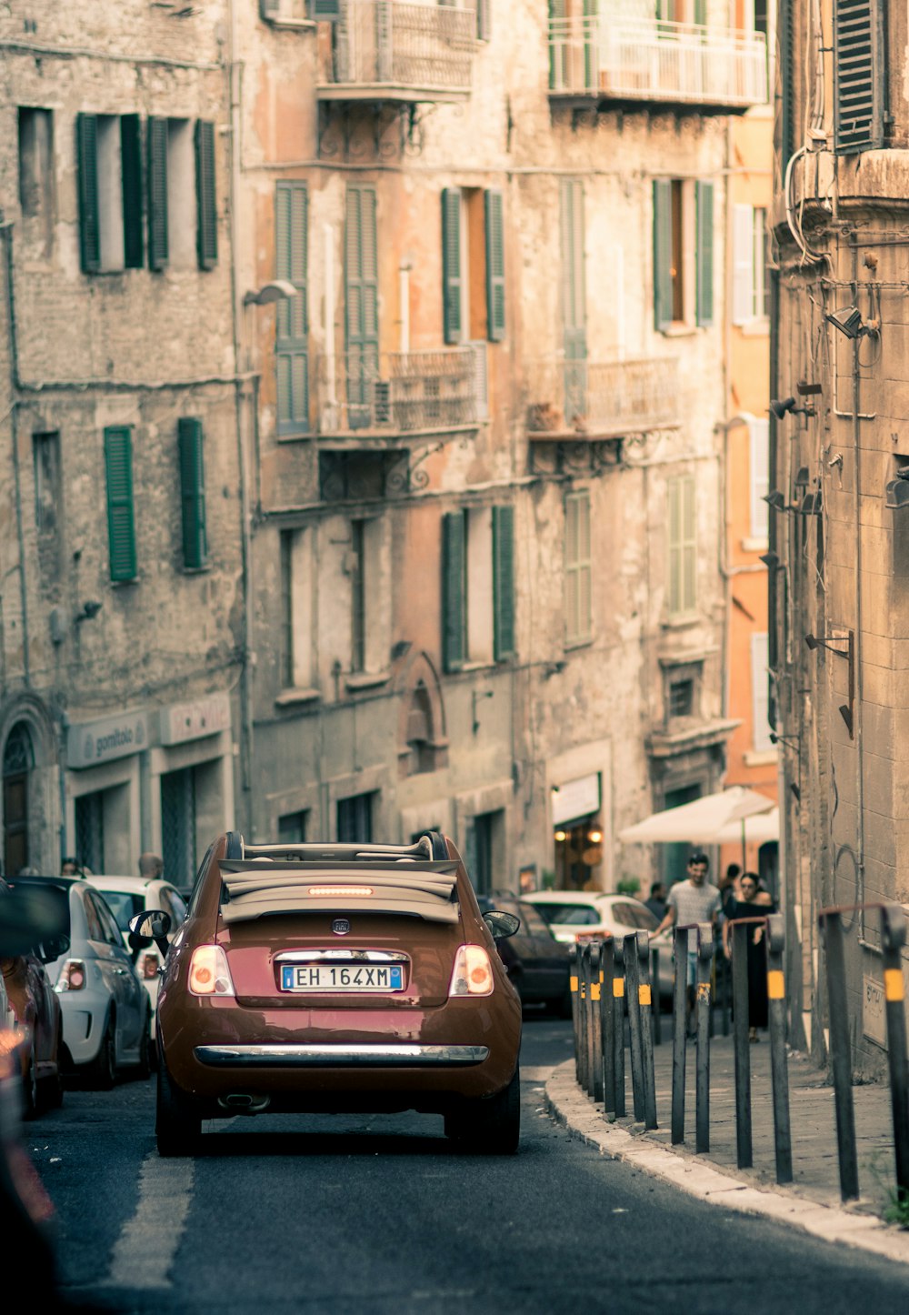 brown car on road