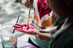 person holding paintbrush
