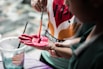 person holding paintbrush
