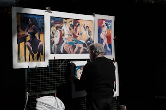 Art gallery interior with paintings on display