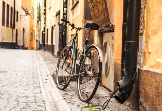 city bike parked at air condenser in Gamla stan Sweden