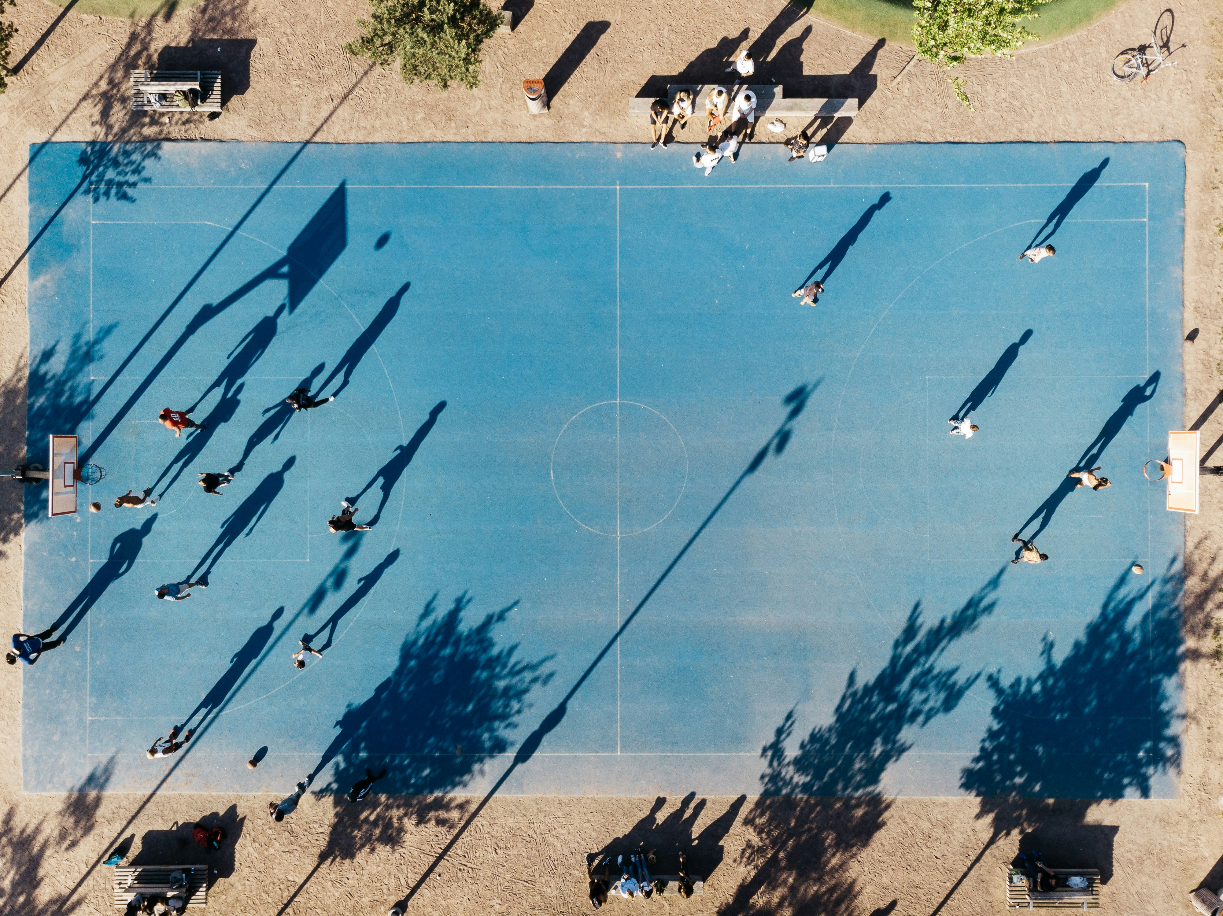 aerial view of basketball court with players inside