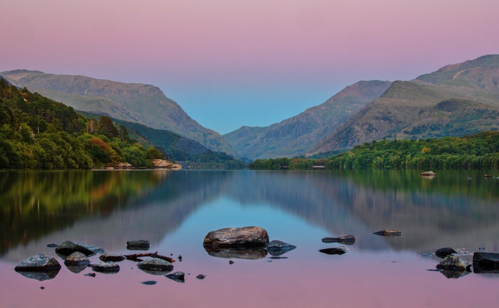 landscape photography of mountain range and lake