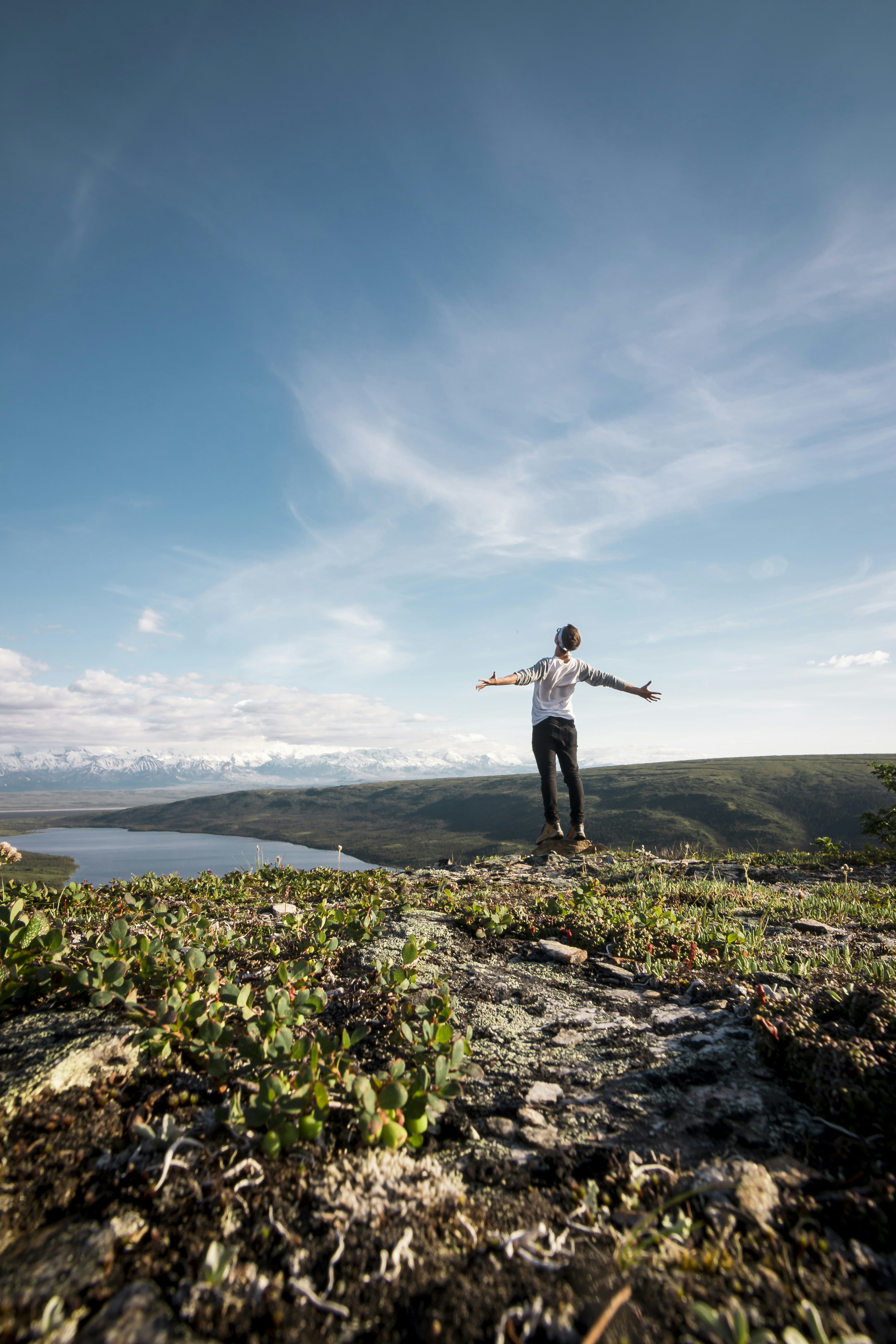 person on mountain cliff