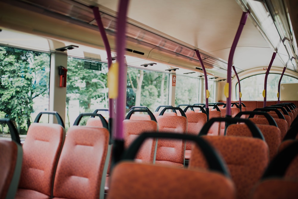 orange vehicle seat inside vehicle