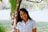 woman standing beside tree