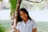 woman standing beside tree