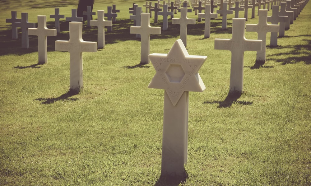 gray tombstone in graveyard