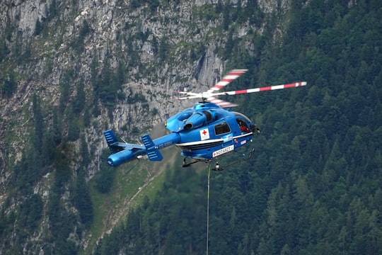 blue and white helicopter in Lofer Austria