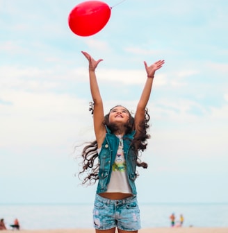 girl raising her hand