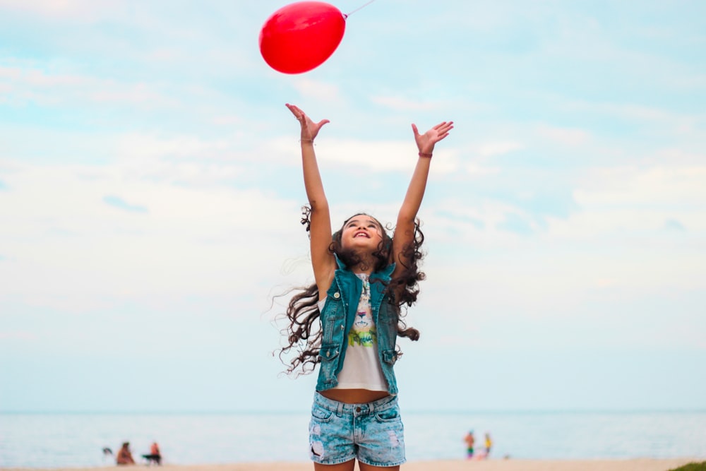 girl raising her hand