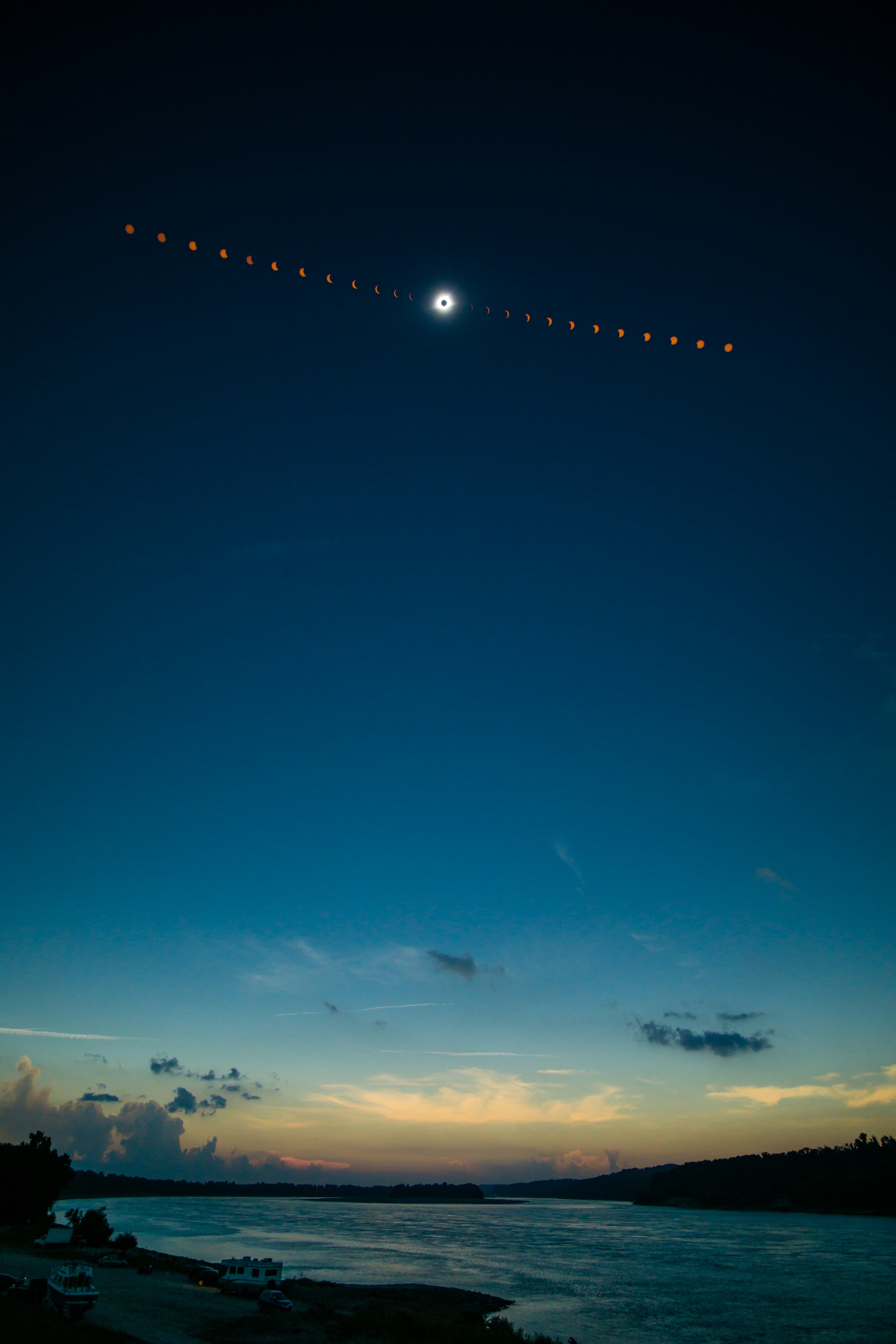 They say your photography should capture more than what you saw, but how you felt in that moment. Embarking on a thousand-mile road trip to Grand Tower, Illinois, a small town on the banks of the great Mississippi River. Nervous and excited to make the most of the event, I set up my tripod and put on the solar filter just before first contact. The moon covering more and more of the sun while I fired away on the shutter release. The air became cooler, the sky grew darker, and then… majesty. Over two minutes of wonder; a 360 degree sunset and the most awe-inspiring sight ever to behold.