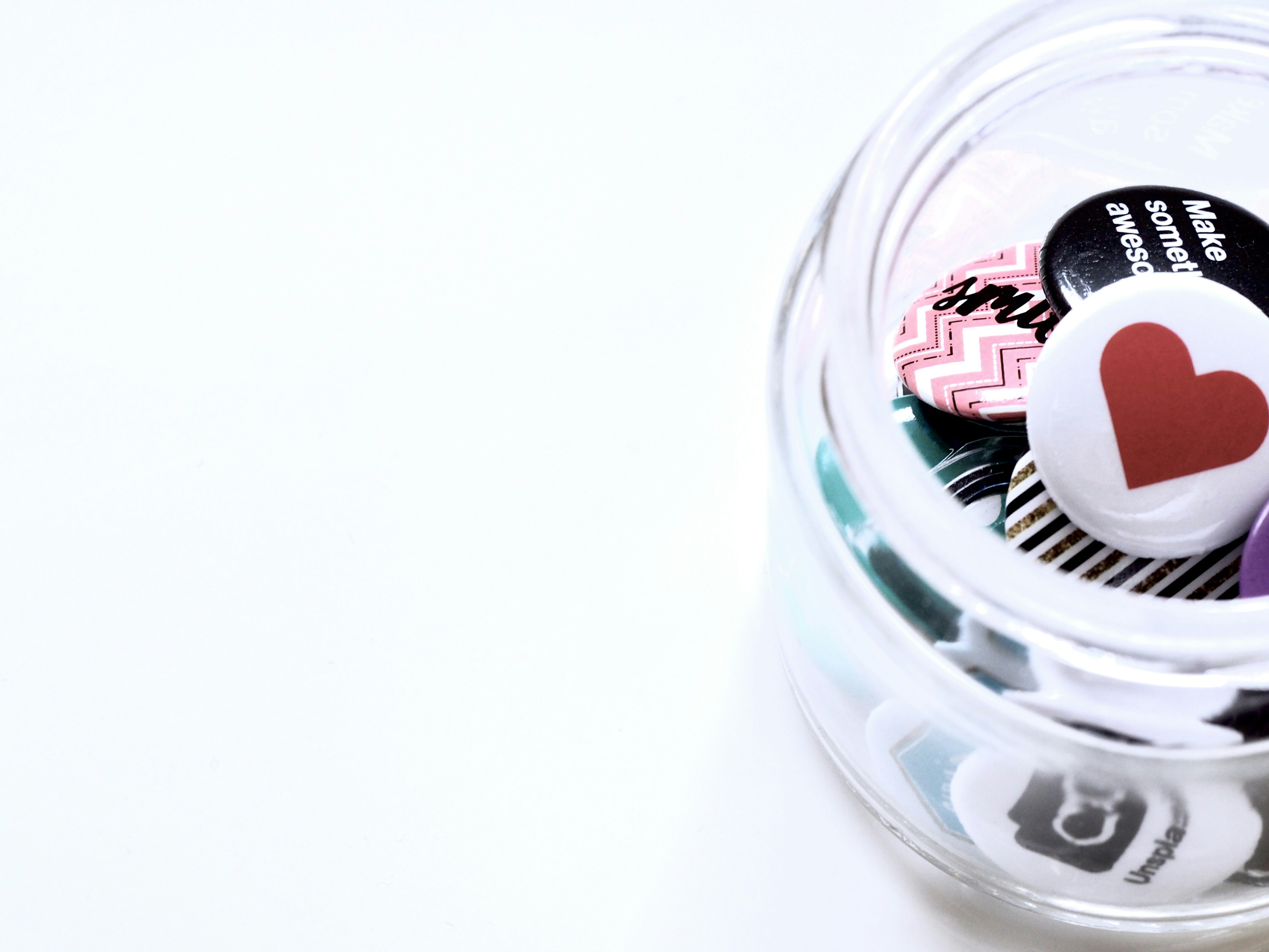 clear jar with buttons