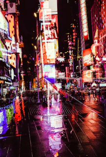 An outdoor LED billboard illuminating a busy city street at night with crisp visuals.