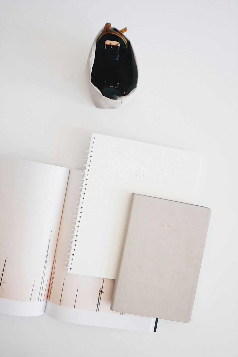 two white books on surface