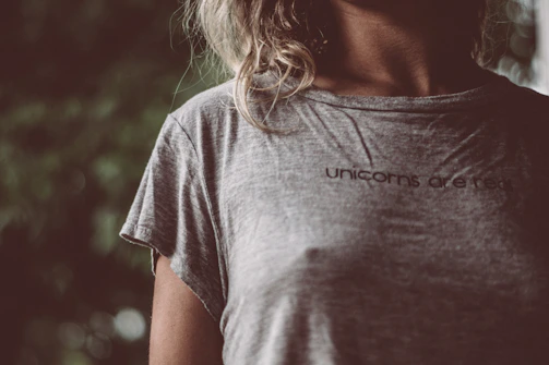 A lifestyle shot of a person wearing a subtle yet striking mythical character t-shirt, blending vintage vibes with modern style.