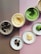 ice creams in white plastic containers