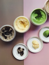 ice creams in white plastic containers