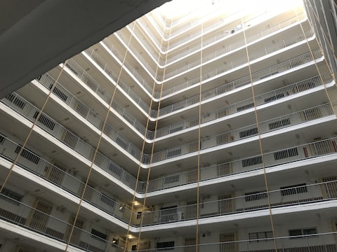 Motion image capturing the exterior and common areas of a residential condominium.