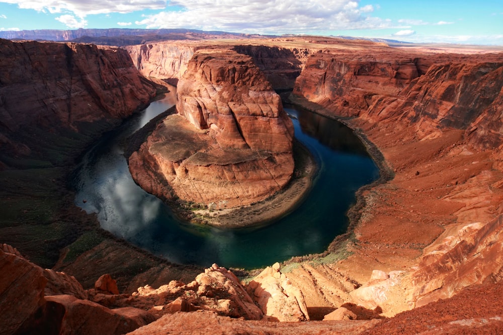 body of water across mountain