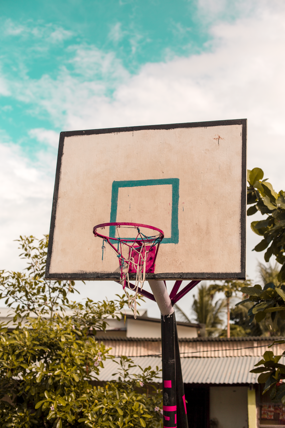 white, green, and red basketball hoop